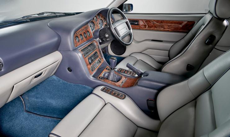 Illustration for article titled Live Your Best Life With This $450,000 Aston Martin Vantage V600 With A WWII Spitfire Boost Gauge